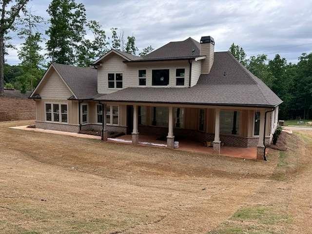 4563 Fawn Path, Gainesville, GA 30506 - view of front of home with a chimney and a porch