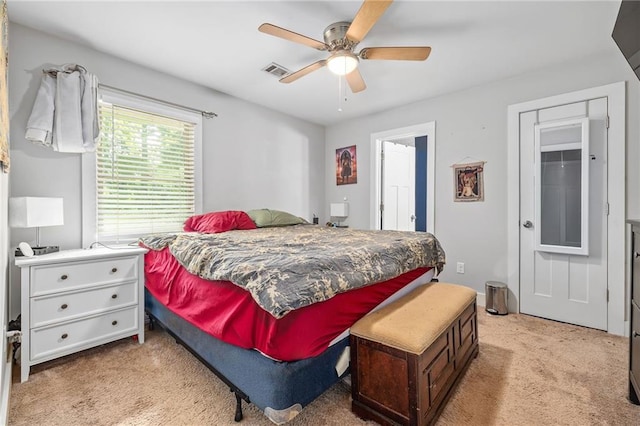 312 Glen Iris Dr, Monroe, GA 30655 - bedroom featuring light carpet and ceiling fan