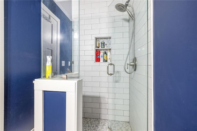 312 Glen Iris Dr, Monroe, GA 30655 - bathroom featuring a stall shower and vanity