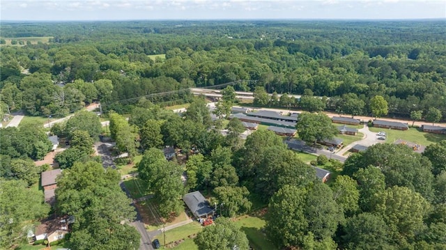 312 Glen Iris Dr, Monroe, GA 30655 - aerial overview of property's location featuring a heavily wooded area