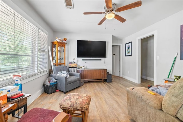 312 Glen Iris Dr, Monroe, GA 30655 - living room featuring a ceiling fan and light wood-style floors