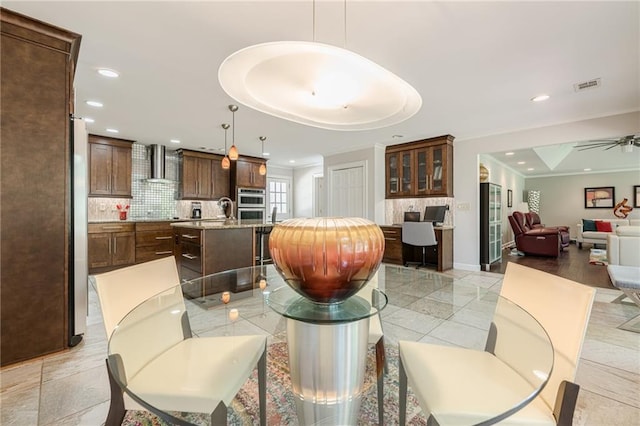 535 Brickleberry Ln, Roswell, GA 30075 - living room with recessed lighting, ornamental molding, ceiling fan, and a raised ceiling