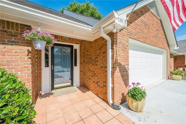 535 Brickleberry Ln, Roswell, GA 30075 - entrance to property with a garage, brick siding, and driveway