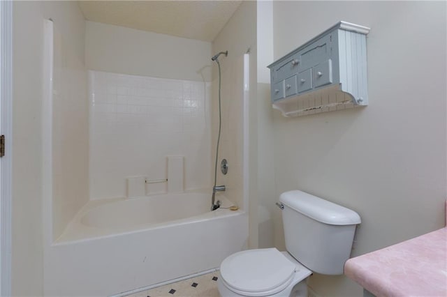 full bath with toilet, vanity, and bathing tub / shower combination