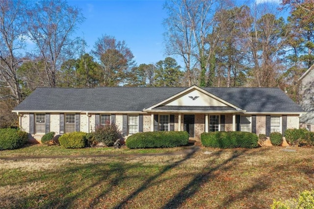 single story home with a front yard