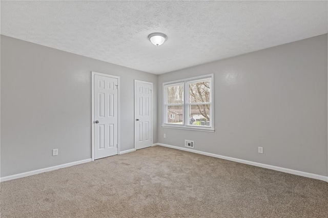 interior space with a textured ceiling