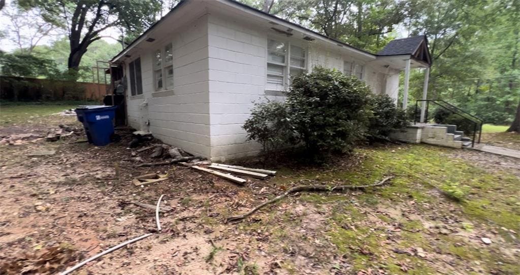 6194 Polly Anna Ave SE, Covington, GA 30014 - view of property exterior with concrete block siding