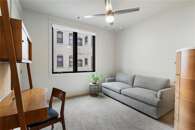 carpeted living room featuring visible vents and ceiling fan