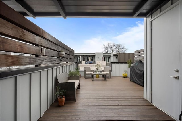 deck with outdoor lounge area