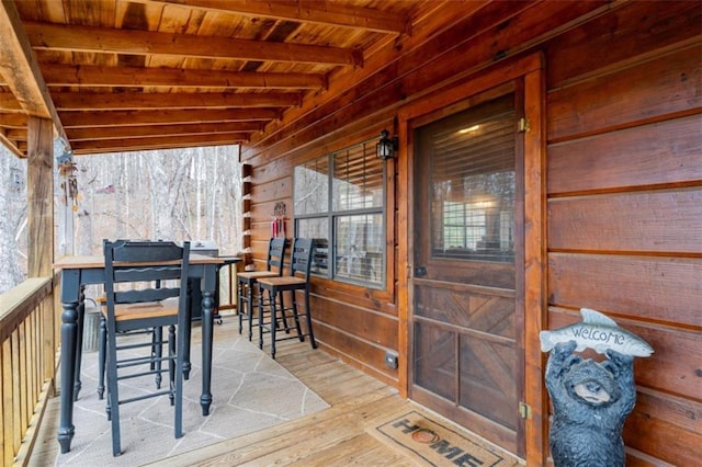 wooden deck featuring outdoor dry bar
