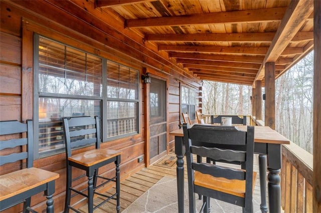 exterior space featuring beamed ceiling