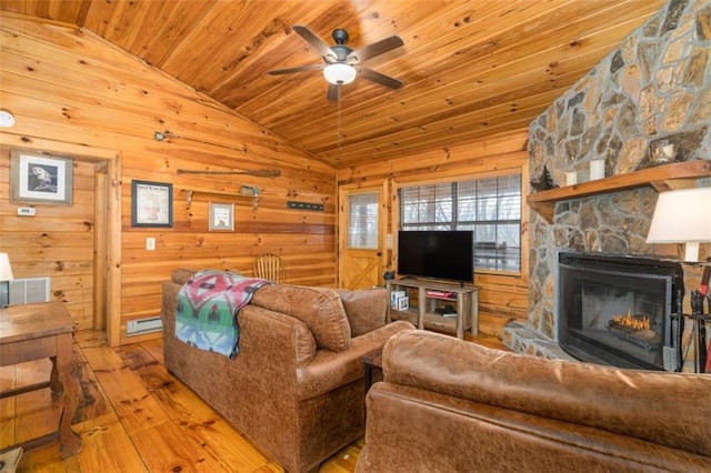 living room with wood ceiling, wood-type flooring, lofted ceiling, and ceiling fan