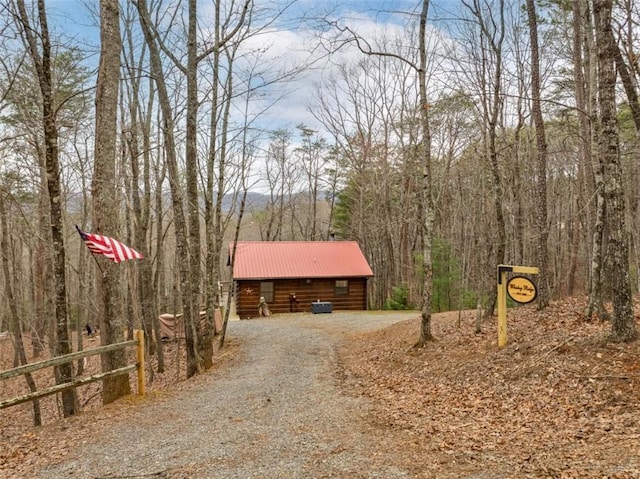 exterior space featuring gravel driveway