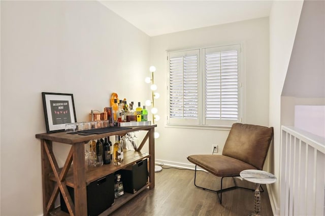 1209 Brookhaven Woods Ct NE, Brookhaven, GA 30319 - living area with wood finished floors, baseboards, and a bar