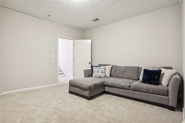 1209 Brookhaven Woods Ct NE, Brookhaven, GA 30319 - carpeted living area featuring a textured ceiling and baseboards