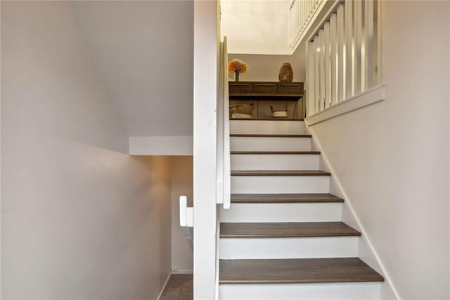 1209 Brookhaven Woods Ct NE, Brookhaven, GA 30319 - stairway with baseboards