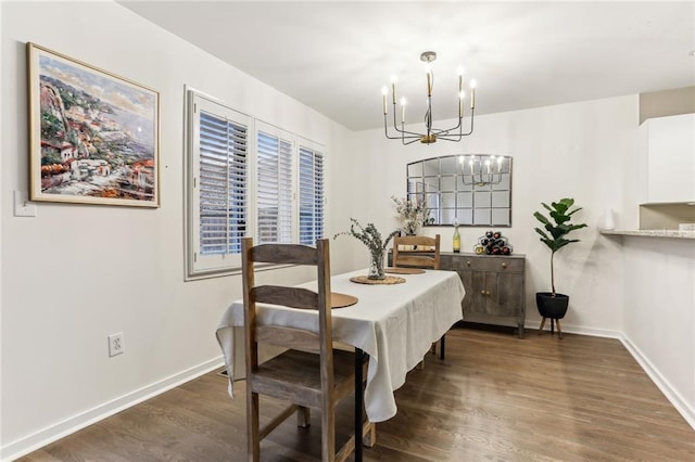 1209 Brookhaven Woods Ct NE, Brookhaven, GA 30319 - dining area with a chandelier, wood finished floors, and baseboards