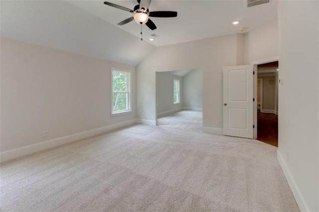 3292 Mill Forest Dr, Conyers, GA 30094 - spare room featuring baseboards, lofted ceiling, a ceiling fan, light carpet, and recessed lighting