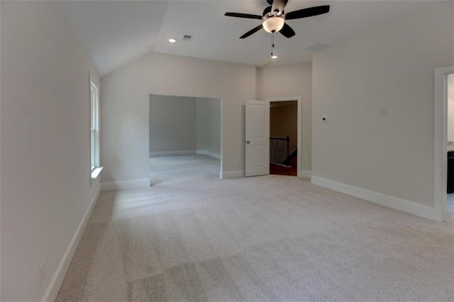 3292 Mill Forest Dr, Conyers, GA 30094 - interior space featuring light colored carpet, baseboards, lofted ceiling, a ceiling fan, and recessed lighting