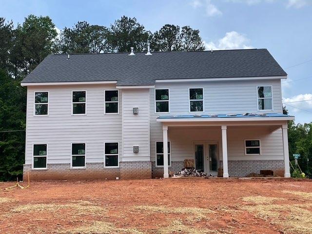 3292 Mill Forest Dr, Conyers, GA 30094 - back of property featuring brick siding and french doors