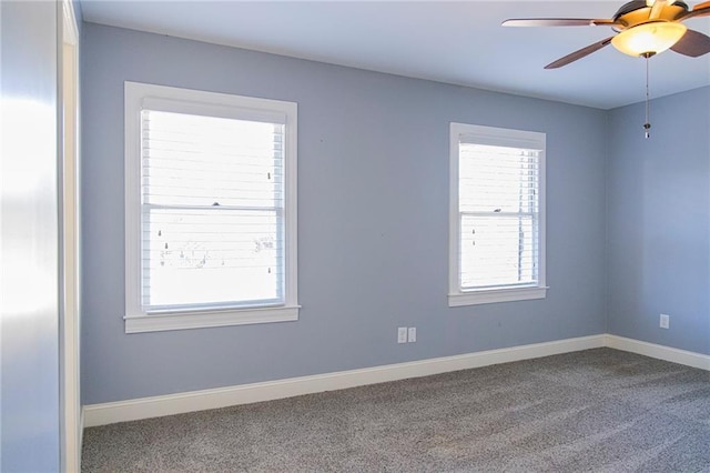 empty room with carpet floors and ceiling fan