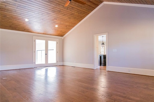 unfurnished room featuring hardwood / wood-style floors, ceiling fan, wood ceiling, and french doors