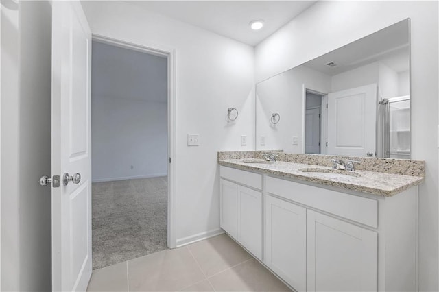 bathroom featuring vanity and tile patterned flooring