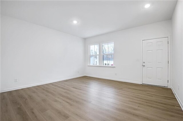 bedroom featuring light colored carpet