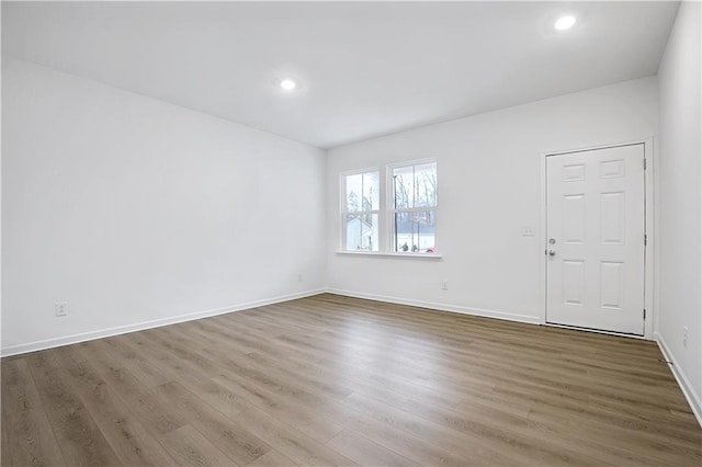 empty room featuring hardwood / wood-style floors