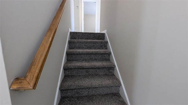 staircase with baseboards