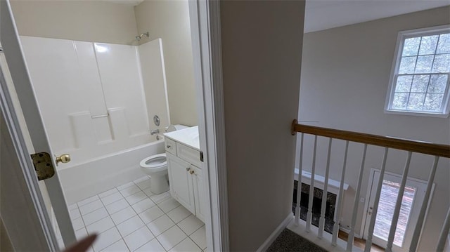 full bath with tile patterned flooring, bathing tub / shower combination, toilet, and vanity