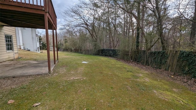 view of yard with a patio and fence