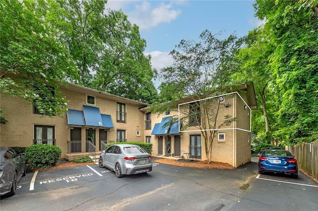 2023 Oakview Rd SE Unit 226, Atlanta, GA 30317 - view of property featuring uncovered parking