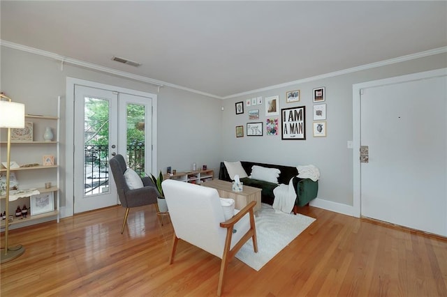 2023 Oakview Rd SE Unit 226, Atlanta, GA 30317 - living area with light wood-type flooring, ornamental molding, and french doors