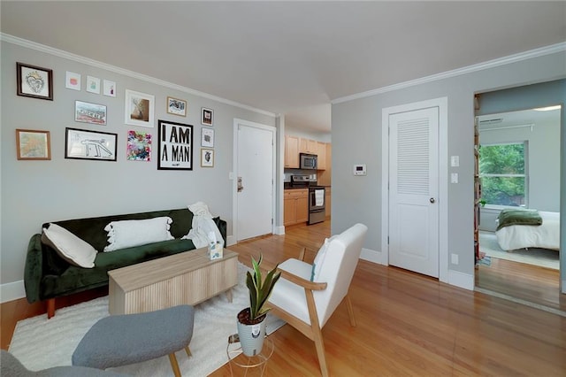 2023 Oakview Rd SE Unit 226, Atlanta, GA 30317 - living area with crown molding and light wood finished floors
