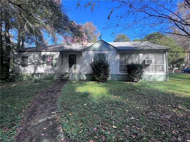 ranch-style house with a front yard