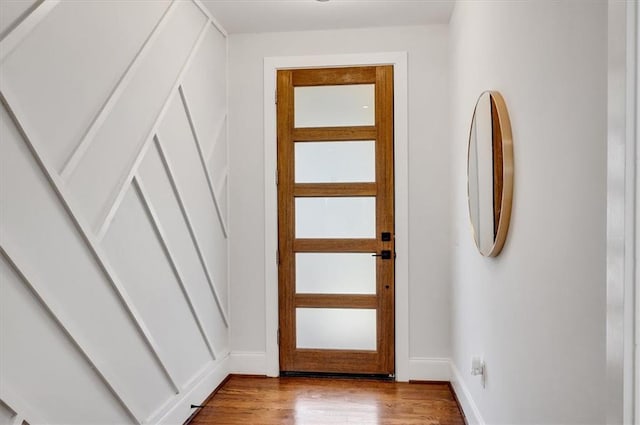 doorway with light hardwood / wood-style flooring