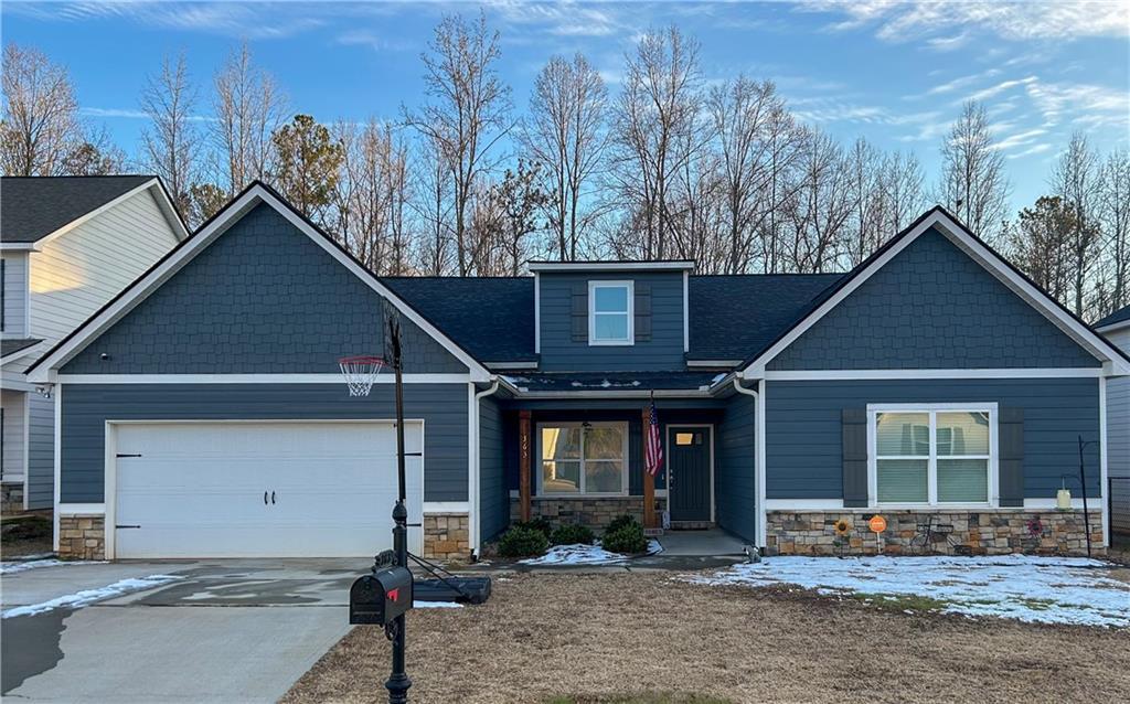 craftsman inspired home featuring a garage