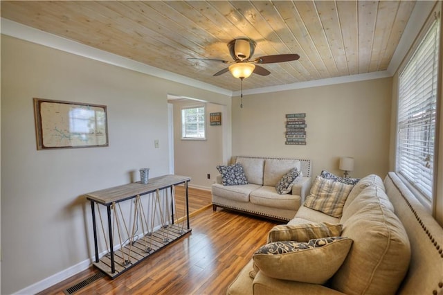 233 S Spring Rd, Eatonton, GA 31024 - living area featuring ceiling fan, crown molding, wood finished floors, and wooden ceiling