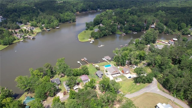 233 S Spring Rd, Eatonton, GA 31024 - view of property location with a nearby body of water and a heavily wooded area