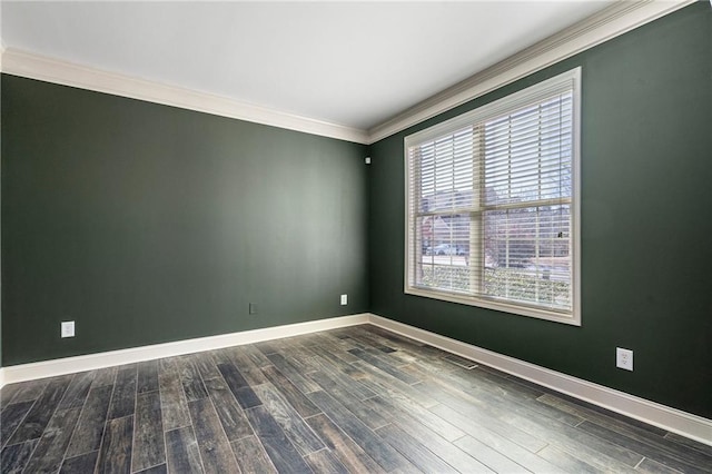 unfurnished room with dark hardwood / wood-style flooring and ornamental molding