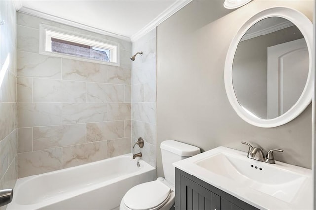 full bathroom featuring crown molding, vanity, tiled shower / bath combo, and toilet