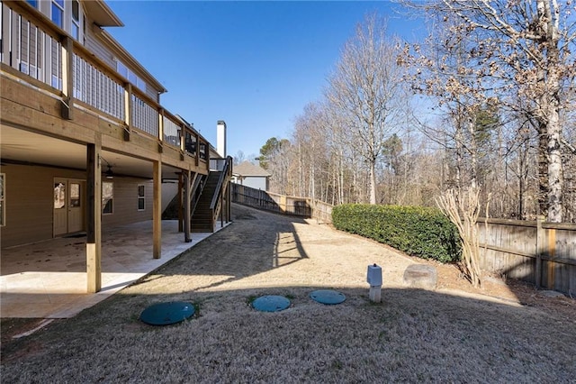 view of yard with a patio area and a deck