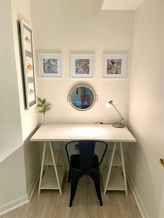 office space featuring light wood-type flooring