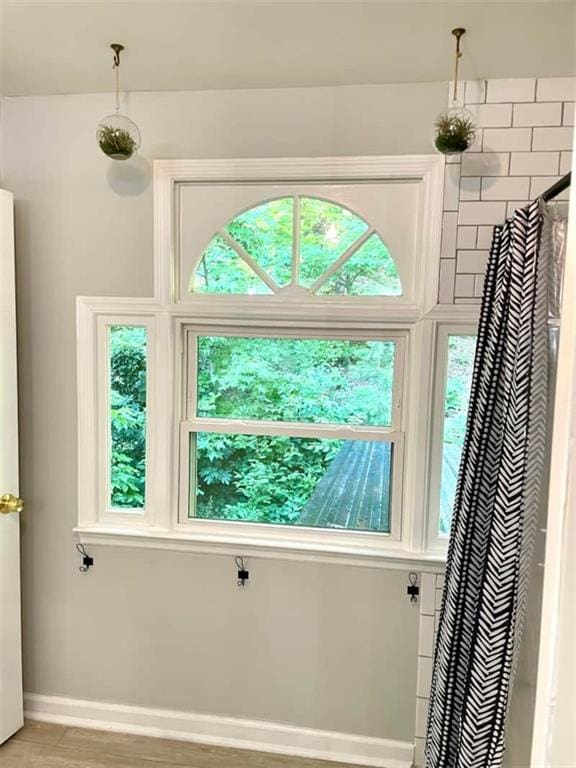 doorway to outside featuring hardwood / wood-style flooring