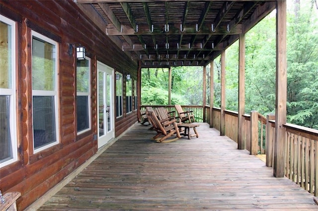 wooden deck with a pergola