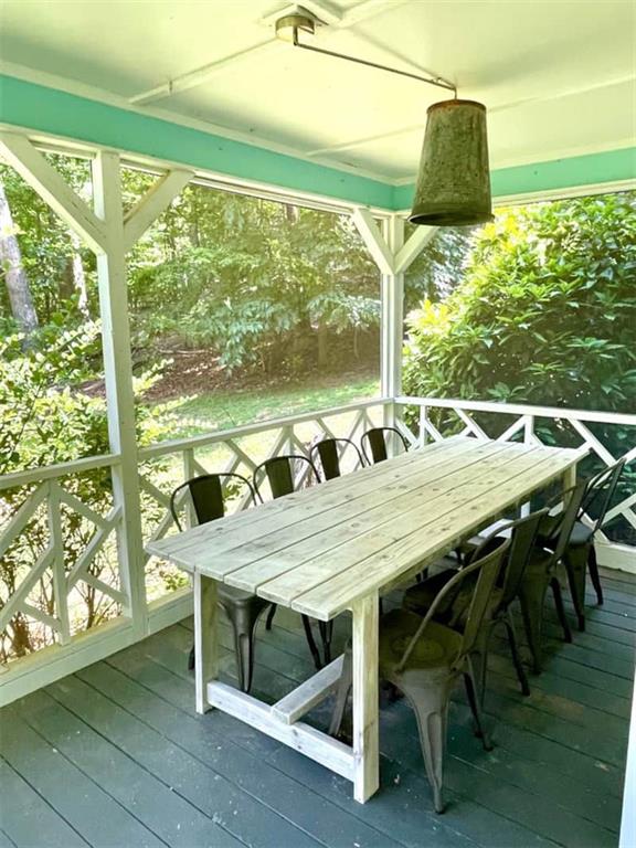 unfurnished sunroom featuring plenty of natural light