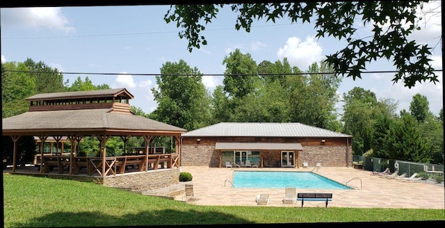 view of pool with a gazebo, a patio area, and a yard