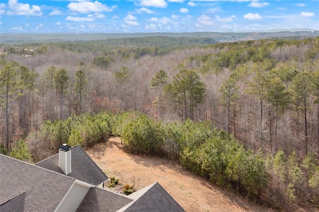 bird's eye view featuring a view of trees