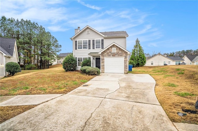 front facade with a front yard and a garage